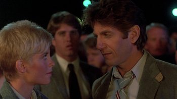 Movie still from “The Legend of Billie Jean” (1985), directed by Matthew Robbins – A man and a woman are talking to each other; Close Up shot, Over the shoulder angle
