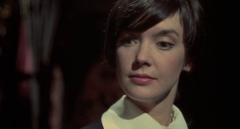 Movie still from “The Legend of Hell House” (1973), directed by John Hough – A person with short hair; Close Up shot, High angle