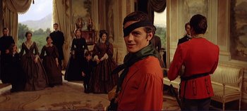 Movie still from “The Leopard” (1963), directed by Luchino Visconti – A man with a blindfold on his head; Medium shot, Over the shoulder angle