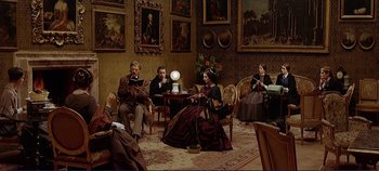 Movie still from “The Leopard” (1963), directed by Luchino Visconti – A group of people sitting around a room; Wide shot, High angle