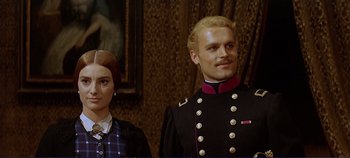 Movie still from “The Leopard” (1963), directed by Luchino Visconti – A man and a woman dressed in costumes; Close Up shot, Low angle