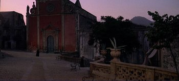 Movie still from “The Leopard” (1963), directed by Luchino Visconti – An image of an outdoor setting with a church in the background; Extreme Wide shot, Low angle
