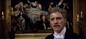 Movie still from “The Leopard” (1963), directed by Luchino Visconti – A person in front of a painting; Close Up shot, Low angle
