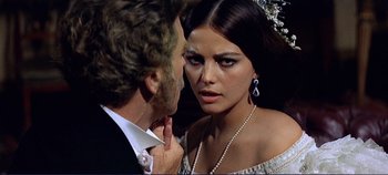 Movie still from “The Leopard” (1963), directed by Luchino Visconti – A man and a woman looking into each others eyes; Close Up shot, Over the shoulder angle