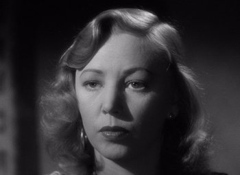 Movie still from “The Leopard Man” (1943), directed by Jacques Tourneur – A black and white photo of a woman's face; Close Up shot, Low angle