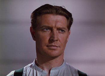 Movie still from “The Life and Death of Colonel Blimp” (1943), directed by Emeric Pressburger – A person wearing a white shirt; Close Up shot, Low angle