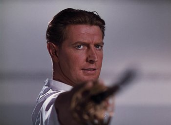 Movie still from “The Life and Death of Colonel Blimp” (1943), directed by Emeric Pressburger – A person holding a baseball glove; Close Up shot, Low angle