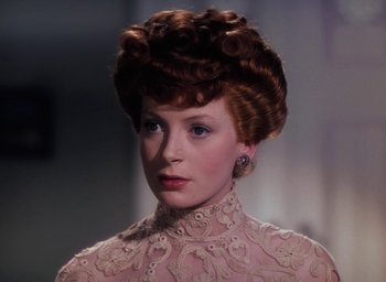 Movie still from “The Life and Death of Colonel Blimp” (1943), directed by Emeric Pressburger – A person wearing a dress; Close Up shot, Over the shoulder angle