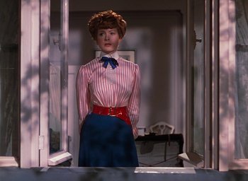 Movie still from “The Life and Death of Colonel Blimp” (1943), directed by Emeric Pressburger – A woman standing in front of an open window; Medium shot, Low angle