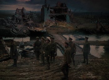Movie still from “The Life and Death of Colonel Blimp” (1943), directed by Emeric Pressburger – A group of men standing next to each other in a field; Extreme Wide shot, High angle