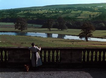 Movie still from “The Life and Death of Colonel Blimp” (1943), directed by Emeric Pressburger – A man standing on a balcony overlooking a valley; Extreme Wide shot, High angle