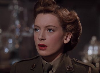 Movie still from “The Life and Death of Colonel Blimp” (1943), directed by Emeric Pressburger – A person wearing a military uniform; Close Up shot, High angle