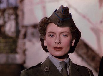 Movie still from “The Life and Death of Colonel Blimp” (1943), directed by Emeric Pressburger – A person wearing a hat; Close Up shot, Low angle