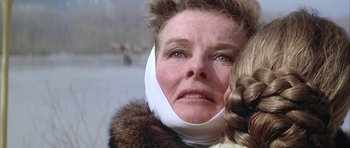 Movie still from “The Lion in Winter” (1968), directed by Anthony Harvey – A person wearing a neck brace; Close Up shot, Low angle