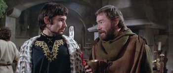 Movie still from “The Lion in Winter” (1968), directed by Anthony Harvey – Two men in medieval garb talking to each other; Medium shot, Over the shoulder angle