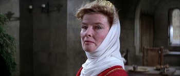 Movie still from “The Lion in Winter” (1968), directed by Anthony Harvey – A person wearing a headscarf; Close Up shot, Low angle