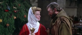 Movie still from “The Lion in Winter” (1968), directed by Anthony Harvey – A man and a woman dressed in medieval garb; Medium shot, Over the shoulder angle