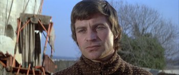 Movie still from “The Lion in Winter” (1968), directed by Anthony Harvey – A person wearing a sweater; Close Up shot, Low angle