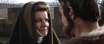 Movie still from “The Lion in Winter” (1968), directed by Anthony Harvey – An older woman is wrapped in a blanket; Close Up shot, Over the shoulder angle