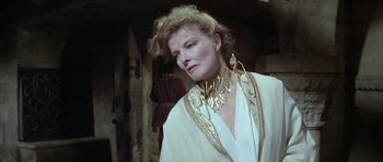 Movie still from “The Lion in Winter” (1968), directed by Anthony Harvey – A person wearing a necklace; Close Up shot, Over the shoulder angle