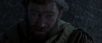 Movie still from “The Lion in Winter” (1968), directed by Anthony Harvey – A person with a beard looking at the camera; Close Up shot, Over the shoulder angle