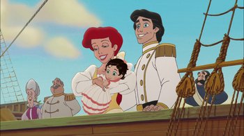 Movie still from “The Little Mermaid II: Return to the Sea” (2000), directed by Bill Speers – The little girl is being carried by the prince; Medium shot, Over the shoulder angle