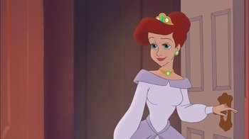 Movie still from “The Little Mermaid II: Return to the Sea” (2000), directed by Bill Speers – A woman in a white dress with a crown on her head; Medium shot, Over the shoulder angle