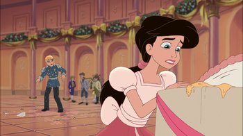 Movie still from “The Little Mermaid II: Return to the Sea” (2000), directed by Bill Speers – A woman in a pink dress is looking at a box; Medium shot, Over the shoulder angle