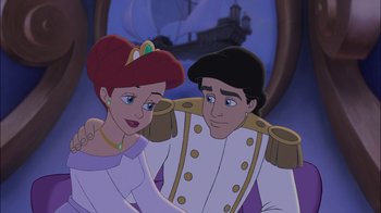 Movie still from “The Little Mermaid II: Return to the Sea” (2000), directed by Bill Speers – A man and a woman are standing next to each other in front of a ship; Medium shot, Over the shoulder angle