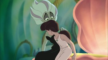 Movie still from “The Little Mermaid II: Return to the Sea” (2000), directed by Bill Speers – A couple of people that are looking at each other; Medium shot, Over the shoulder angle