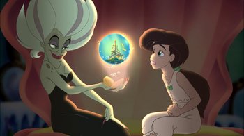 Movie still from “The Little Mermaid II: Return to the Sea” (2000), directed by Bill Speers – A woman sitting next to another woman holding an object; Medium shot, Over the shoulder angle