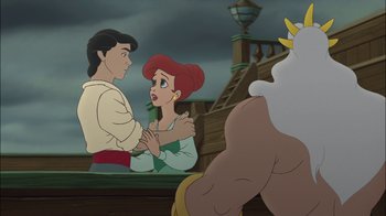 Movie still from “The Little Mermaid II: Return to the Sea” (2000), directed by Bill Speers – A couple of people that are looking at each other; Medium shot, Over the shoulder angle