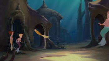 Movie still from “The Little Mermaid: Ariel's Beginning” (2008), directed by Peggy Holmes – An underwater scene with a fish swimming in the water; Extreme Wide shot, Low angle