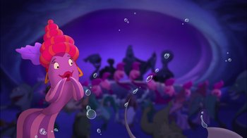 Movie still from “The Little Mermaid: Ariel's Beginning” (2008), directed by Peggy Holmes – An image of an underwater scene with a pink fish; Wide shot, High angle
