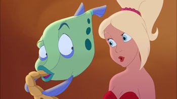 Movie still from “The Little Mermaid: Ariel's Beginning” (2008), directed by Peggy Holmes – A woman is looking at a fish in a cartoon; Close Up shot, Over the shoulder angle