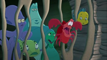 Movie still from “The Little Mermaid: Ariel's Beginning” (2008), directed by Peggy Holmes – A group of cartoon characters with a crab in the background; Wide shot, Low angle