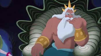 Movie still from “The Little Mermaid: Ariel's Beginning” (2008), directed by Peggy Holmes – A man sitting on top of a chair wearing a crown; Medium shot, Low angle