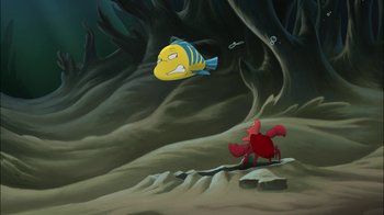 Movie still from “The Little Mermaid: Ariel's Beginning” (2008), directed by Peggy Holmes – An animated scene of a fish and a crab; Extreme Wide shot, High angle