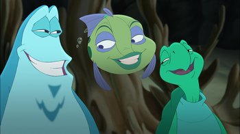 Movie still from “The Little Mermaid: Ariel's Beginning” (2008), directed by Peggy Holmes – A group of three cartoon characters in a forest; Close Up shot, High angle