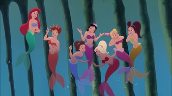 Movie still from “The Little Mermaid: Ariel's Beginning” (2008), directed by Peggy Holmes – A group of mermaids are swimming in the water; Wide shot, High angle
