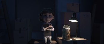 Movie still from “The Little Prince” (2015), directed by Mark Osborne – A cartoon girl standing next to a jar of coins; Medium shot, Over the shoulder angle
