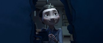 Movie still from “The Little Prince” (2015), directed by Mark Osborne – A cartoon of a man in a suit and tie; Medium shot, Over the shoulder angle