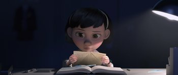 Movie still from “The Little Prince” (2015), directed by Mark Osborne – An animated girl holding an envelope in her hands; Medium shot, High angle