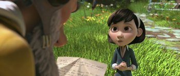 Movie still from “The Little Prince” (2015), directed by Mark Osborne – An animated character looking at a person in a field; Close Up shot, Over the shoulder angle