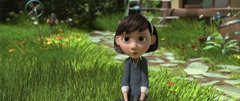 Movie still from “The Little Prince” (2015), directed by Mark Osborne – A cartoon of a little girl sitting in the grass; Medium shot, High angle