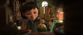 Movie still from “The Little Prince” (2015), directed by Mark Osborne – A girl is eating a bowl of cereal; Medium shot, Over the shoulder angle