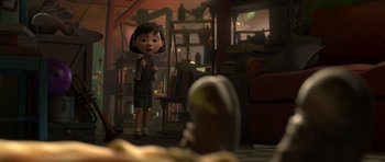 Movie still from “The Little Prince” (2015), directed by Mark Osborne – A cartoon girl standing next to a table; Wide shot, High angle