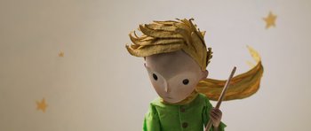 Movie still from “The Little Prince” (2015), directed by Mark Osborne – The head of a paper - mache character; Extreme Close Up shot, Low angle