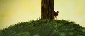 Movie still from “The Little Prince” (2015), directed by Mark Osborne – A person standing next to a tree in the grass; Extreme Wide shot, Low angle