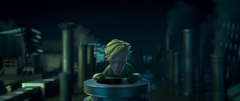 Movie still from “The Little Prince” (2015), directed by Mark Osborne – A boy with blonde hair is looking at a cell phone; Medium shot, High angle